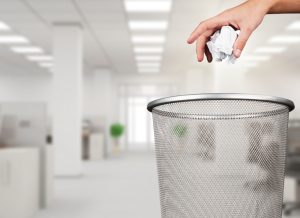 Hand,Throwing,Out,Paper,Into,Trash,Basket,Isolated