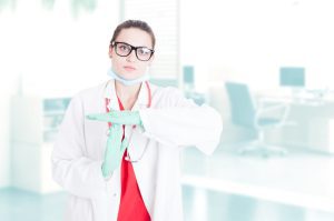 Attractive,Female,Doctor,Or,Medic,Doing,Time,Out,Gesture,As
