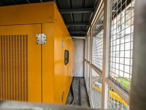 An,Enclosed,Commercial,Backup,Generator,For,A,Business,Establishment.,Placed