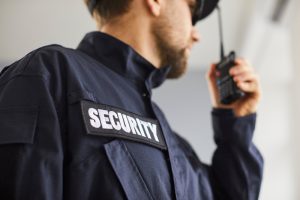 Close,Up,Cropped,Portrait,Of,Confident,Male,Security,Guard,Standing