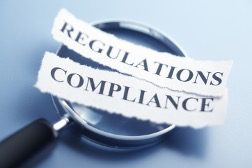 regulations-compliance-magnifying-glass