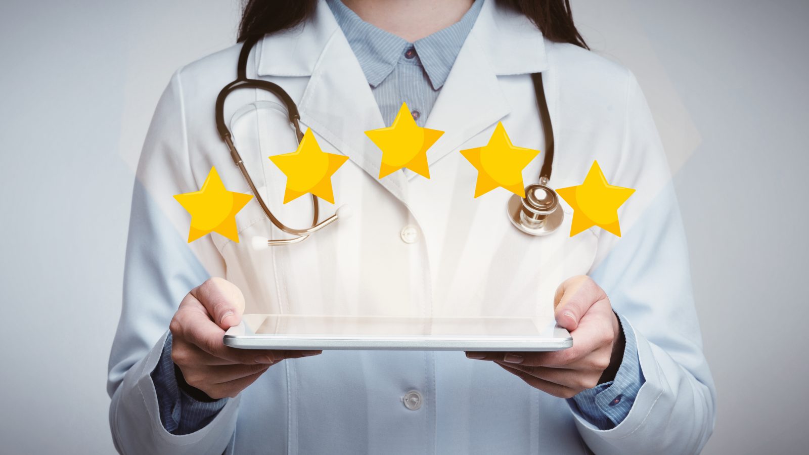 Unrecognizable Female Doctor Holding Digital Tablet With Five Stars Icons Above