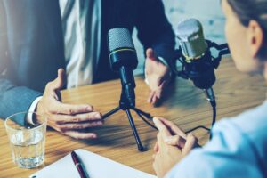 male talking into microphone