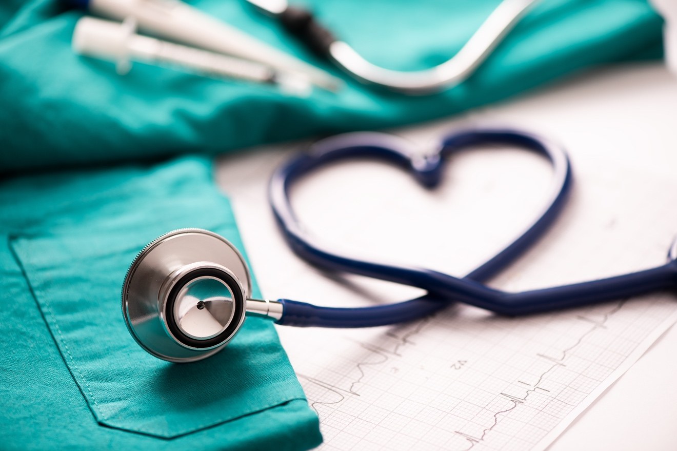 Stethoscope on medical scrubs representing heart attack certification revisions