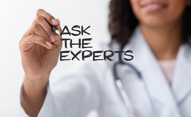 Health Professional writing on the wall with a pen the words - Ask the Experts
