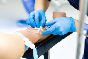 a person having their blood drawn