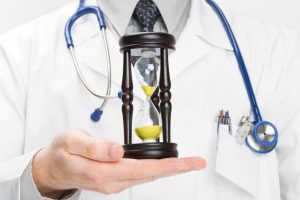 Medical,Doctor,With,Hourglass,In,His,Hand,-,Health,Care