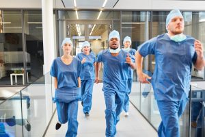 doctors-and-surgeons-running-down-hallway
