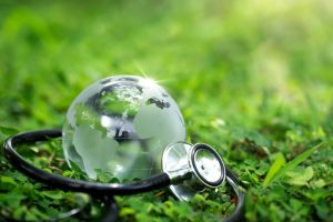 Environment,Earth,Day,Concept.crystal,Earth,With,A,Medical,Doctor's,Stethoscope