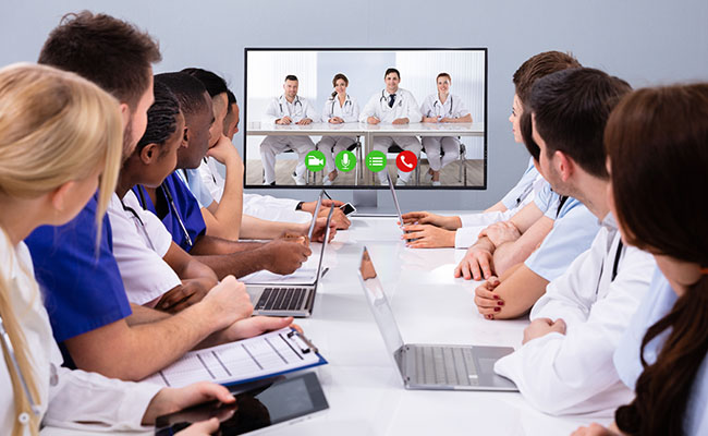 Professional Team Of Multi-ethnic Medical Doctors Having A Video Conference