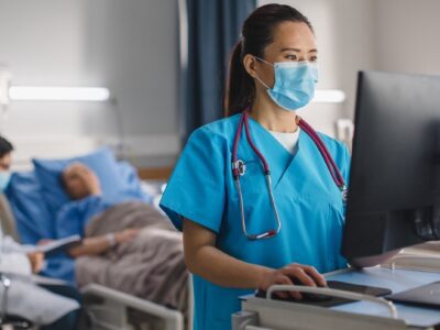 nurse looking in computer