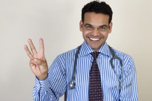 Young,Indian,Doctor,Giving,Three,Advices,With,Smile